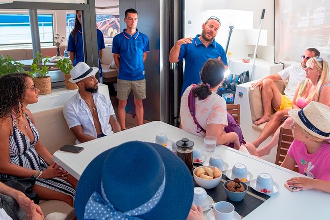 Chania Morning Catamaran Cruise with Premium Lunch & Drinks - Agioi Theodoroi Islands stop: swimming, snorkeling, SUP, and gentle fishing