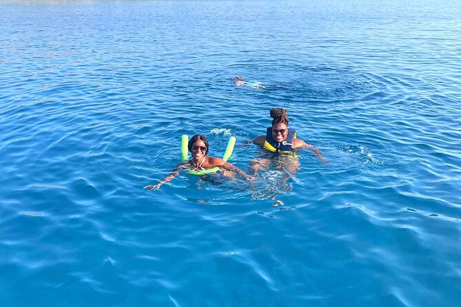 Chania Morning Catamaran Cruise with Premium Lunch & Drinks - The catamaran setup: shaded lounging, included gear, and small comfort wins