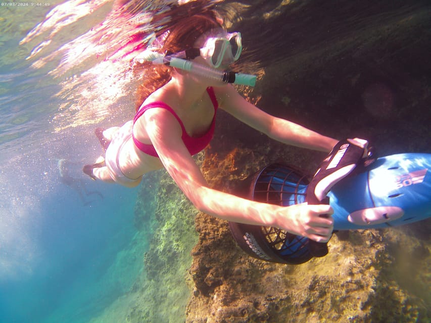 Chania: Sea Scooter Snorkeling boat tour - The boat cruise to Souda Bay: snacks, photos, and that small-group vibe