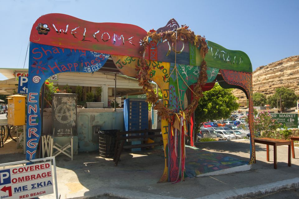 Crete: Matala Beach and Hippie caves, Red beach - Matala Beach: crystal water, cave cliffs, and an easy beach day rhythm