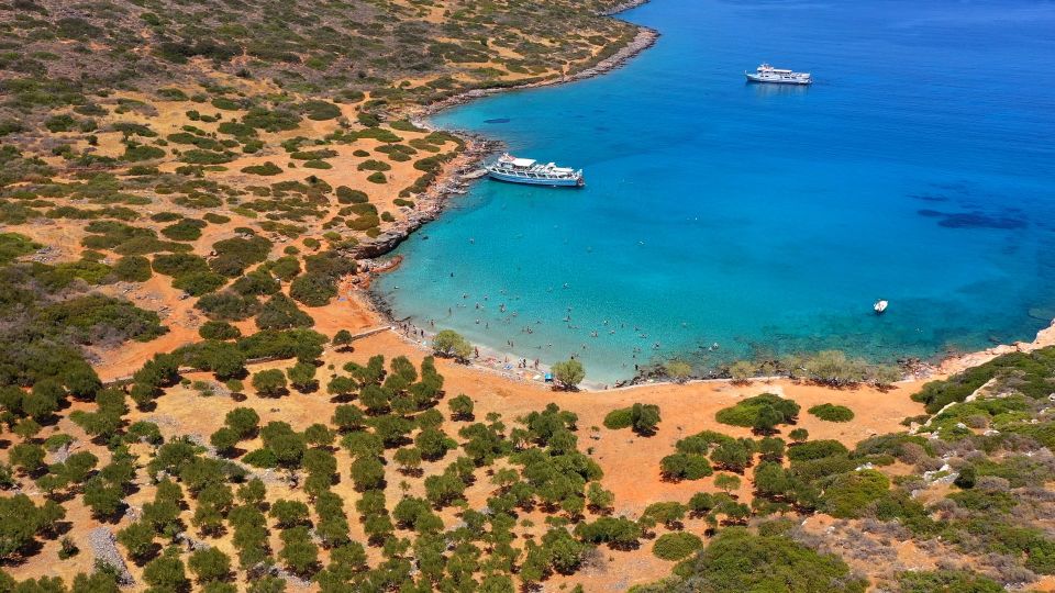 Crete: Mirabello Bay Cruise with Onboard Cocktail - Booking confidence: timing, languages, and the practical fine print