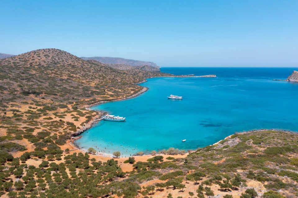 Crete: Mirabello Bay Cruise with Onboard Cocktail - Food, drinks, and boat comfort: what is included and what is not