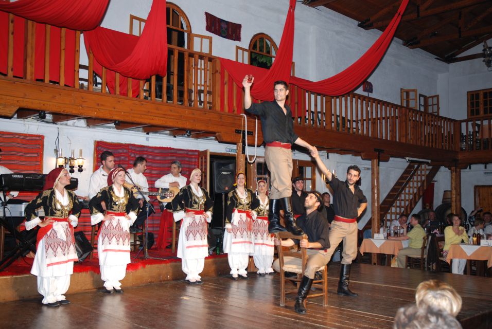 Crete: Traditional Dance Show and Buffet Dinner with Wine - Learning basic folk dance steps with a 2-meter band
