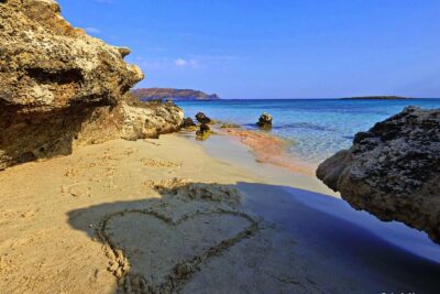 Elafonisi & Falasarna Small Group Tour from Chania w/snacks - Falasarna Beach: long sand, organized comfort, and sunset with a clear horizon
