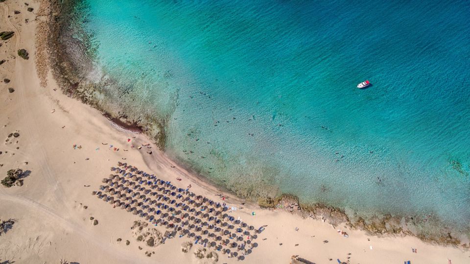 From Chania Area: Day Trip to Elafonisi Island by Bus - Arriving at Elafonisi: Pink Sand, Sand Dunes, and Protected Nature