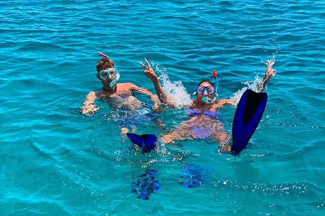 Heraklion: Catamaran Cruise to Dia with Sunset, Meal & Bar - The Dia Island Stop: Snorkeling, SUP, and a Floating Playground