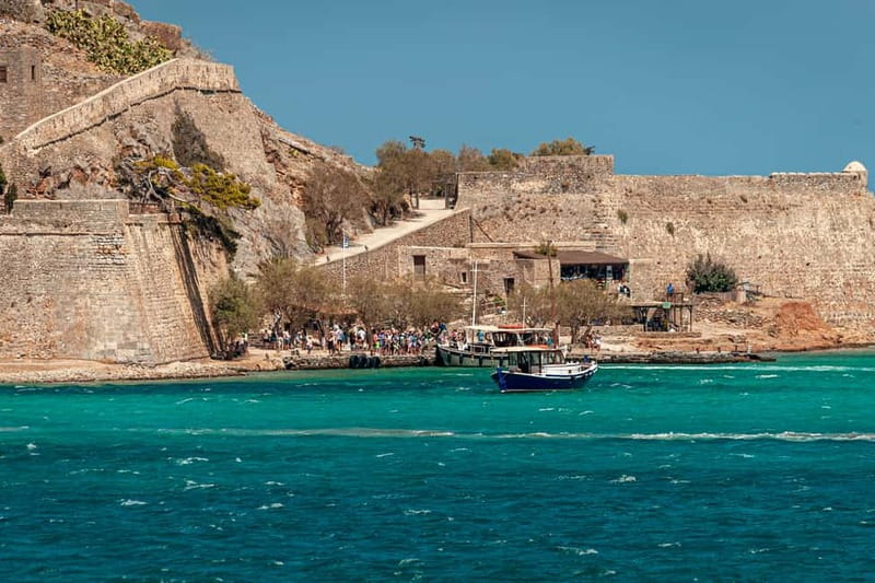 Heraklion: Spinalonga, Agios Nikolaos, & Elounda Boat Tour - Agios Nikolaos and Lake Voulismeni: Shops, Side Streets, and a Bottomless Lake Detail