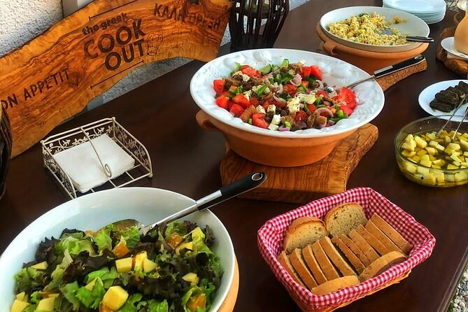 Kissamos: Greek Night Experience with Dancing and Buffet Dinner - Traditional dancing lessons: learn the steps, then join the circle