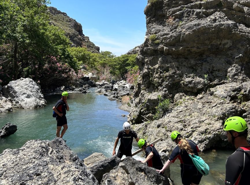 Kourtaliotiko Gorge: Guided River Trekking with Lunch - Gear-up moment: neoprene suits, helmet, poles, and phone protection
