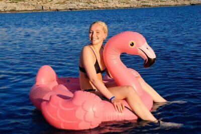 Panormo: Luxury Sunset Catamaran Cruise Sushi & Open Bar - At anchor: SUP, snorkeling gear, and the inflatable flamingo moment