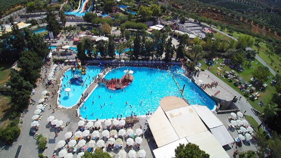 Rethymno Area: Limnoupolis Water Park Ticket with Transfers - Entering the Park: Unlimited Slides and Pools Without Extra Tickets