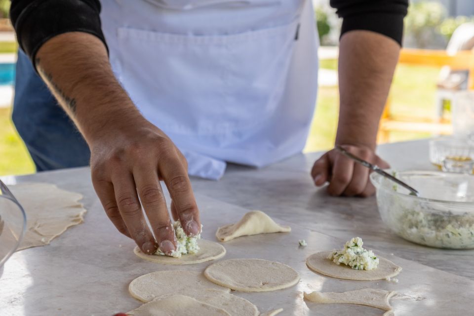 Rethymno: Authentic Cooking Class with a Local - The best part of lunch: outdoor cooking, raki, and real conversation