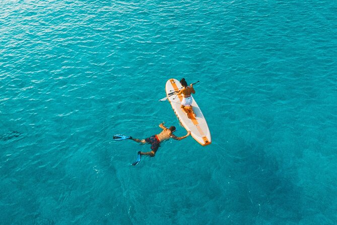 Rethymno: Private Catamaran Cruise with Lunch and Drinks - Deck time, the inflatable flamingo, and your photo moment