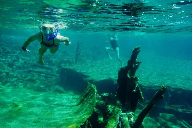 Sea Kayak & Snorkel tours in West Crete - Cave entry, wind, and how the guide keeps it fun