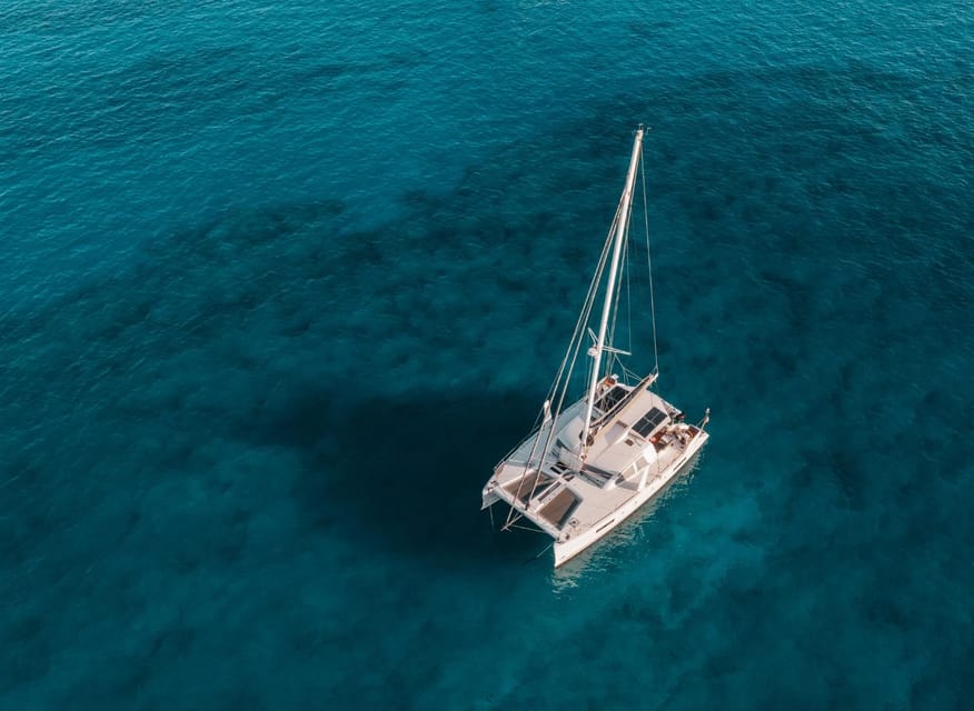 SUP Safari - Catamaran Cruise Dia Island & Gourmet Delights! - Snorkeling near Dia Island: protected waters and practical gear